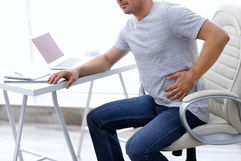 Illustrative image of the article Stomach and Back Pain Together: 8 Causes & What It Means
